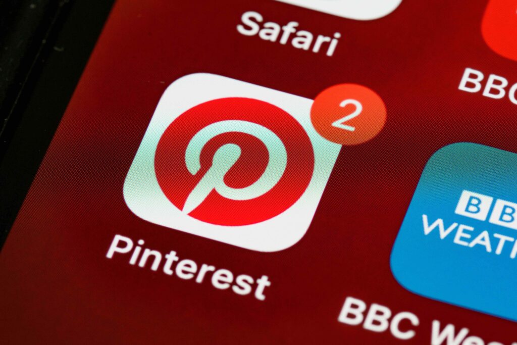 Pinterest app icon with a red notification badge on a phone home screen